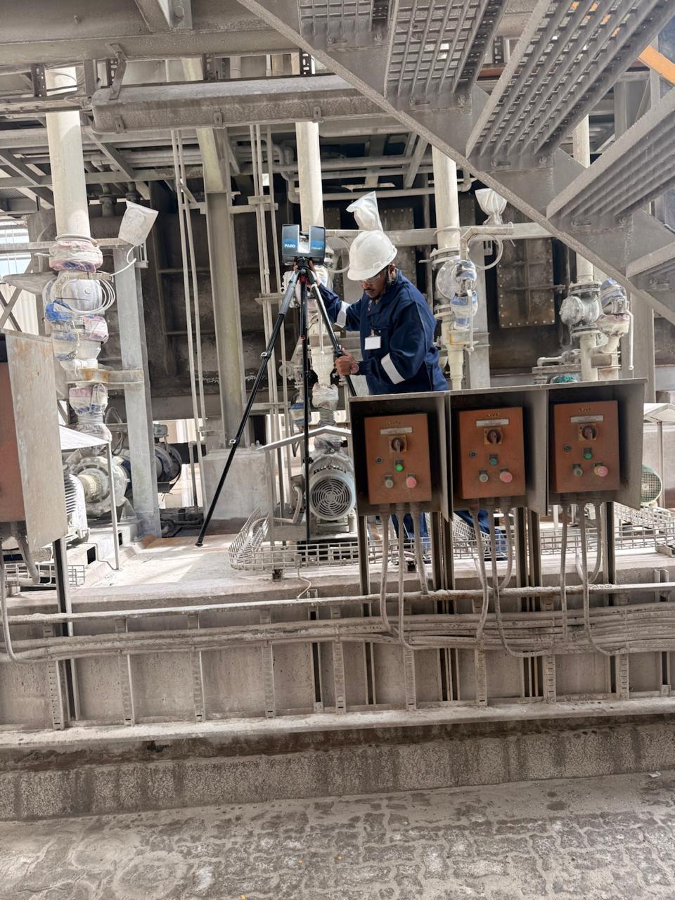 Scanning team at industrial processing area