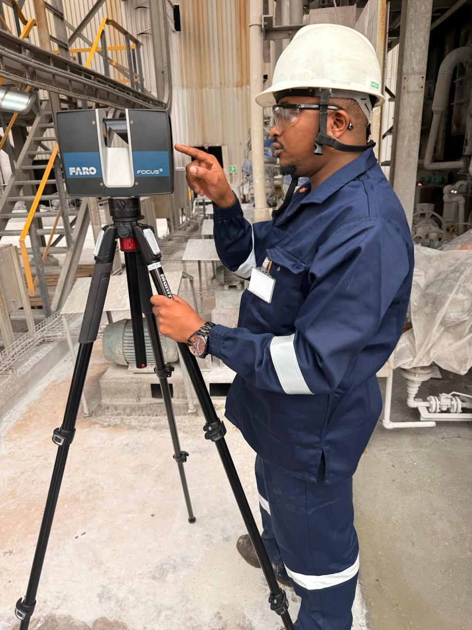 Operator configuring FARO scanner at plant